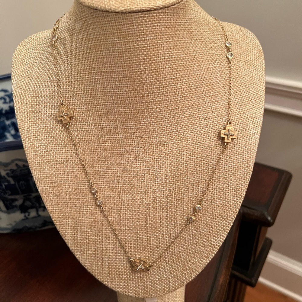 Gold layering necklace with crosses